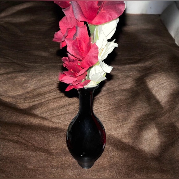 Elegant Black Vase with Red and White Floral Accents